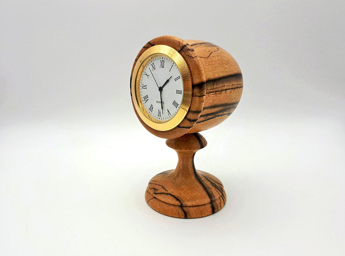 wood turning a desk clock 