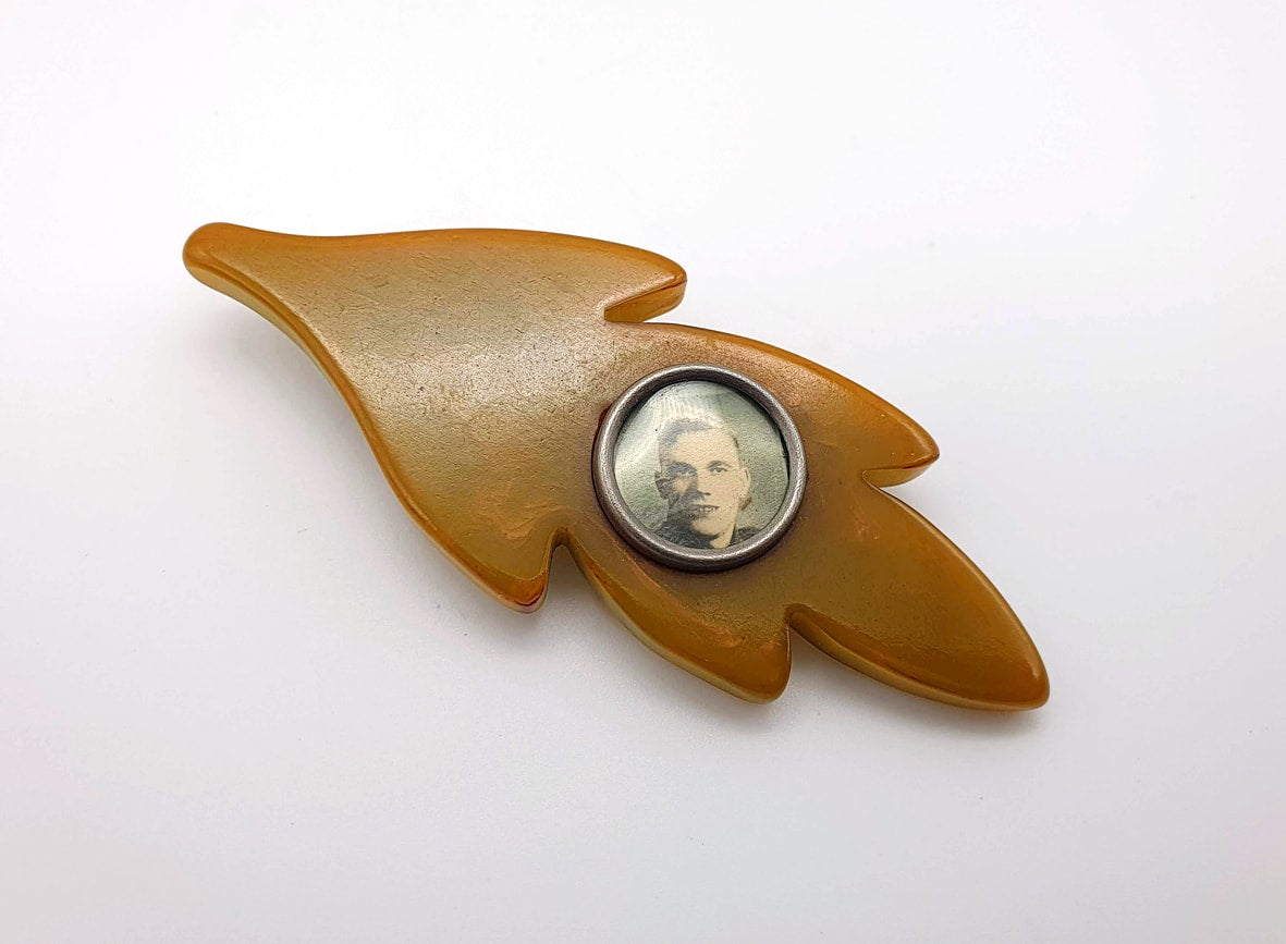 Bakelite brooch hot sale